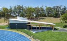 Throws Pavilion - Queensland Sport and Athletics Centre Shale Grey COLORBOND steel roof and running track